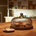 Cloche en verre cannelé avec base en bois