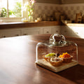 Cloche en verre avec base carrée en marbre