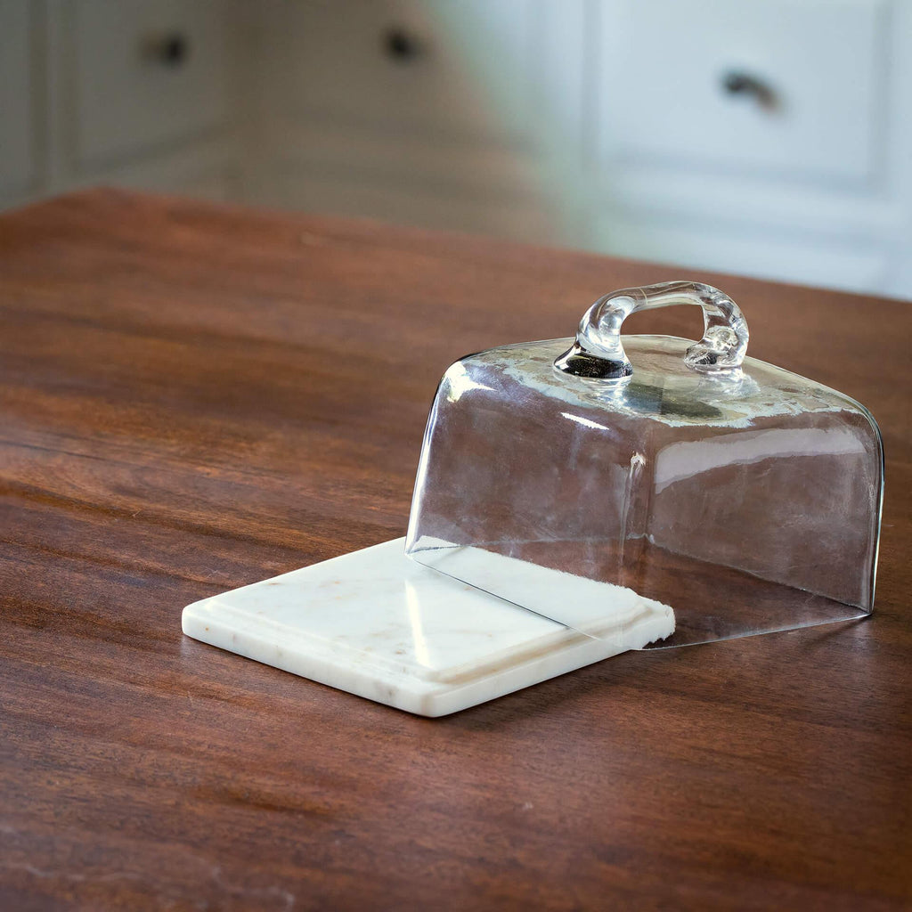 Cloche en verre avec base carrée en marbre