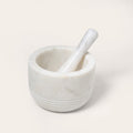 Mortier et pilon en marbre blanc